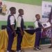 FG distributes laptops to students in FCT community schoo